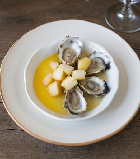 Gratineed Oysters With Diced Apples in a Calv recipe image