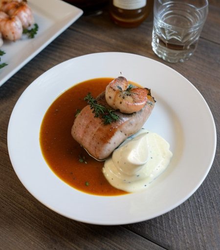 Seafood Stuffed Pork Tenderloin With Shrimp Sauce recipe image